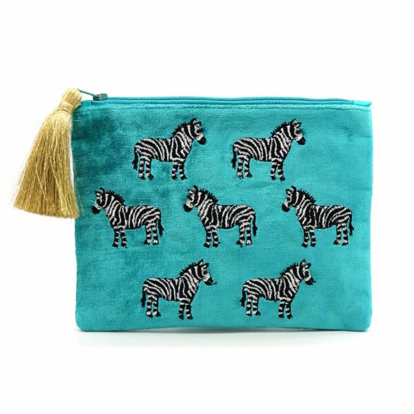 turquoise velvet pouch embroidered with zebras finished with gold tassle