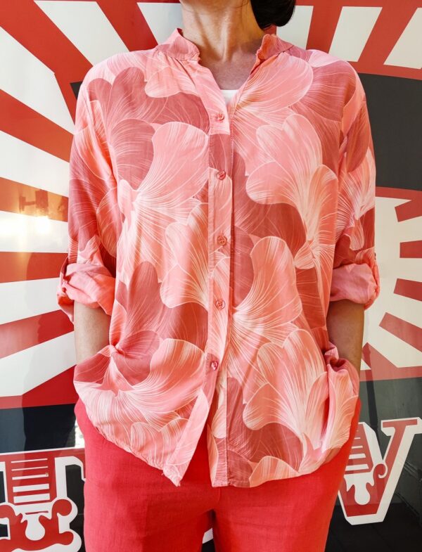Coral collarless button front blouse with roll up sleeve and lotusflower print