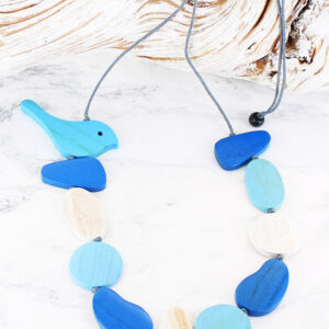 Wooden necklace in shades of blue and white with a painted birdie at the top