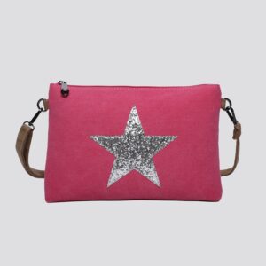 A pink canvas handbag with a long brown strap and a silver glitter star on the front, on a white background