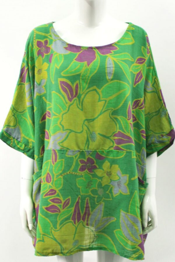A green cotton top with short sleeves and two patch pockets, with a floral print in pink and yellow