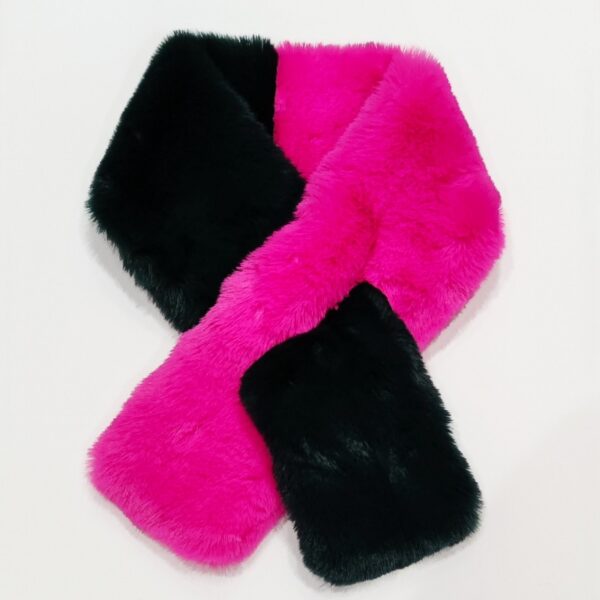 A faux fur collar style scarf in forest green and fuschia with a tuck through loop lying on a plain white background