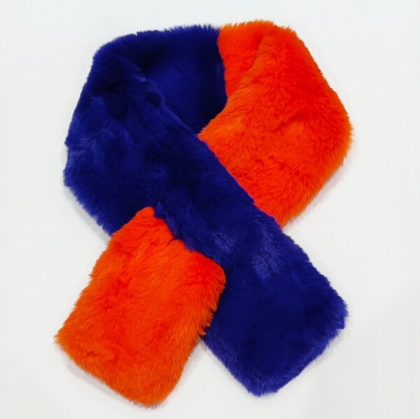 a faaux fur two tone scarf in orange and blue with a tuck through loop on a plain white background