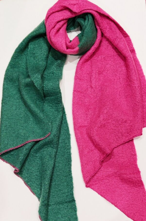 a pink and green heavy weight scarf twisted at the neck on a white background