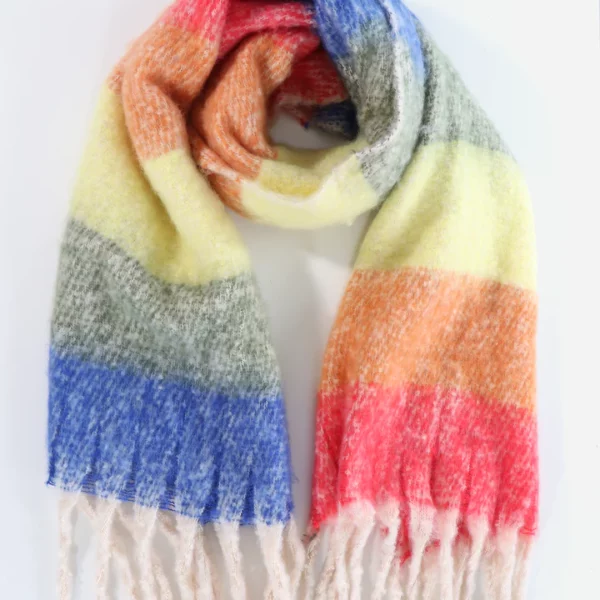 a fluffy scarf in striped colours of blue, green, lemon, red and orange with long white fringing