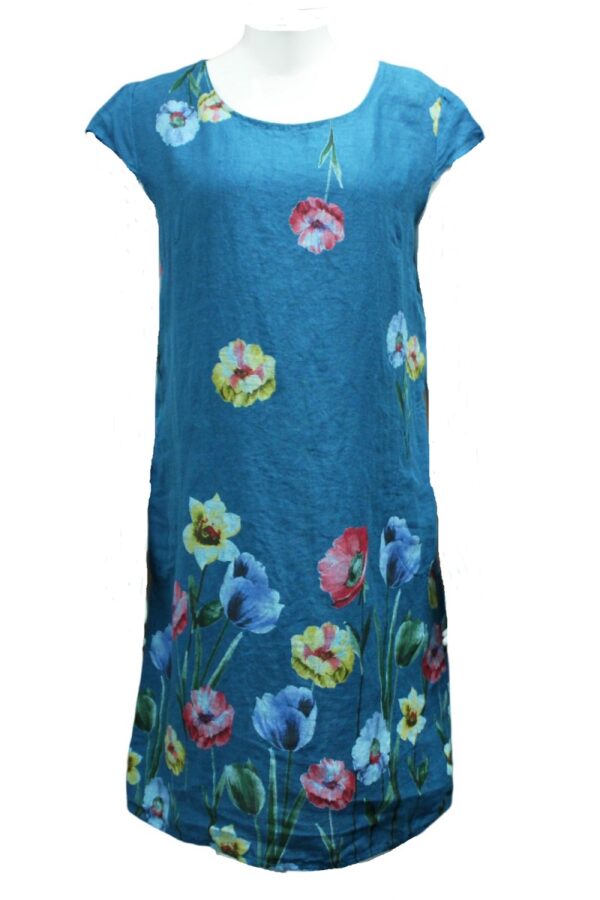 a straight shaped knee length teal linen dress with a cap sleeve and a floral print around the bottom half in red, blue and yellow.