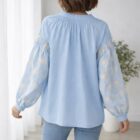 blue embroidered sleeve shirt