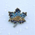 beaded blue leaf brooch