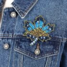 beaded blue leaf brooch